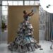 Artful Innovation: A Unique Newspaper Dress Shines in a Creative Photoshoot